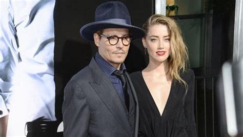 amber heard leaked photos|Amber Heards topless photo sent to Johnny Depp。